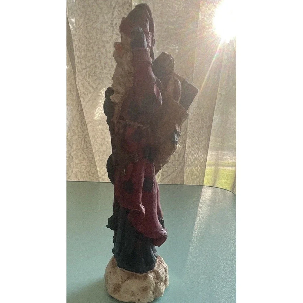 Vintage rustic, resin pencil Santa with toy bag